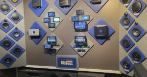 An interactive car audio display wall at an audio shop