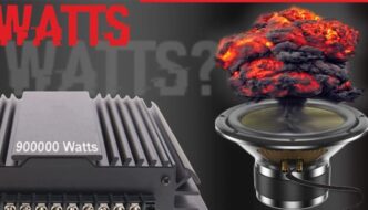 A car audio amplifier and a car audio speaker with an explosion coming out of the top of it